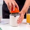 Imagen de Exprimidor manual de jugos con depósito dispensador + mortero 2 en 1