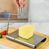Imagen de Cortador de queso - Tabla acero inoxidable y cortante resistente