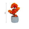 Imagen de Adorno maceta rústica con flores naranjas
