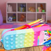 Imagen de Cartuchera pop it con correa y  muñeco
