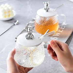 Imagen de Taza de vidrio con asa y cuchara tapa con oso