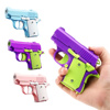 Imagen de Pistola plastica combinada de juguete-4 colores