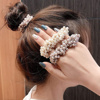 Imagen de Colita para cabello Ushas - Diseño de perlas