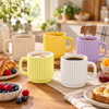 Imagen de Taza ceramica blanco interior ondeado exterior 8x7,5cm-vario
